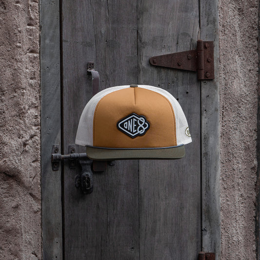 One8 Golden Sands foam trucker hat with sun-soaked desert design, Dubai streetwear cap