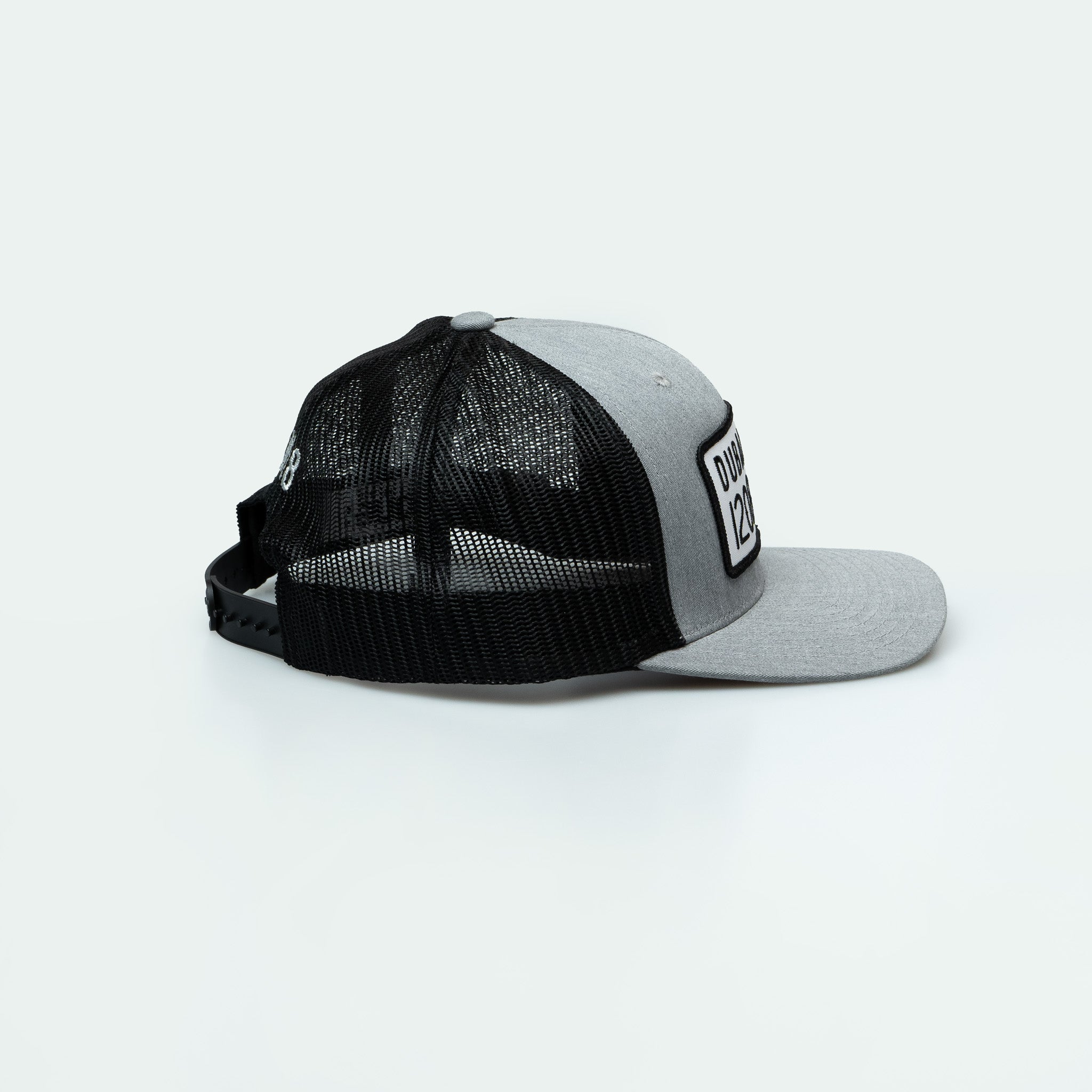 كاب دبي Dubai License Plate Curved Brim Meshback Trucker Hat - One8 Hat- Arabic pop culture