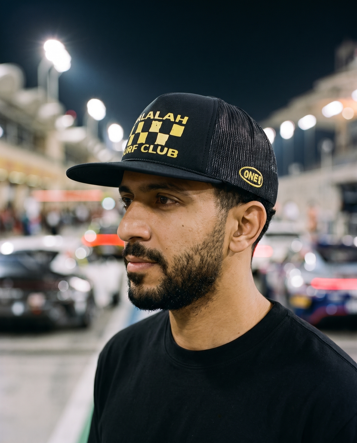 Salalah Surf Club Racing foam trucker side profile - on model