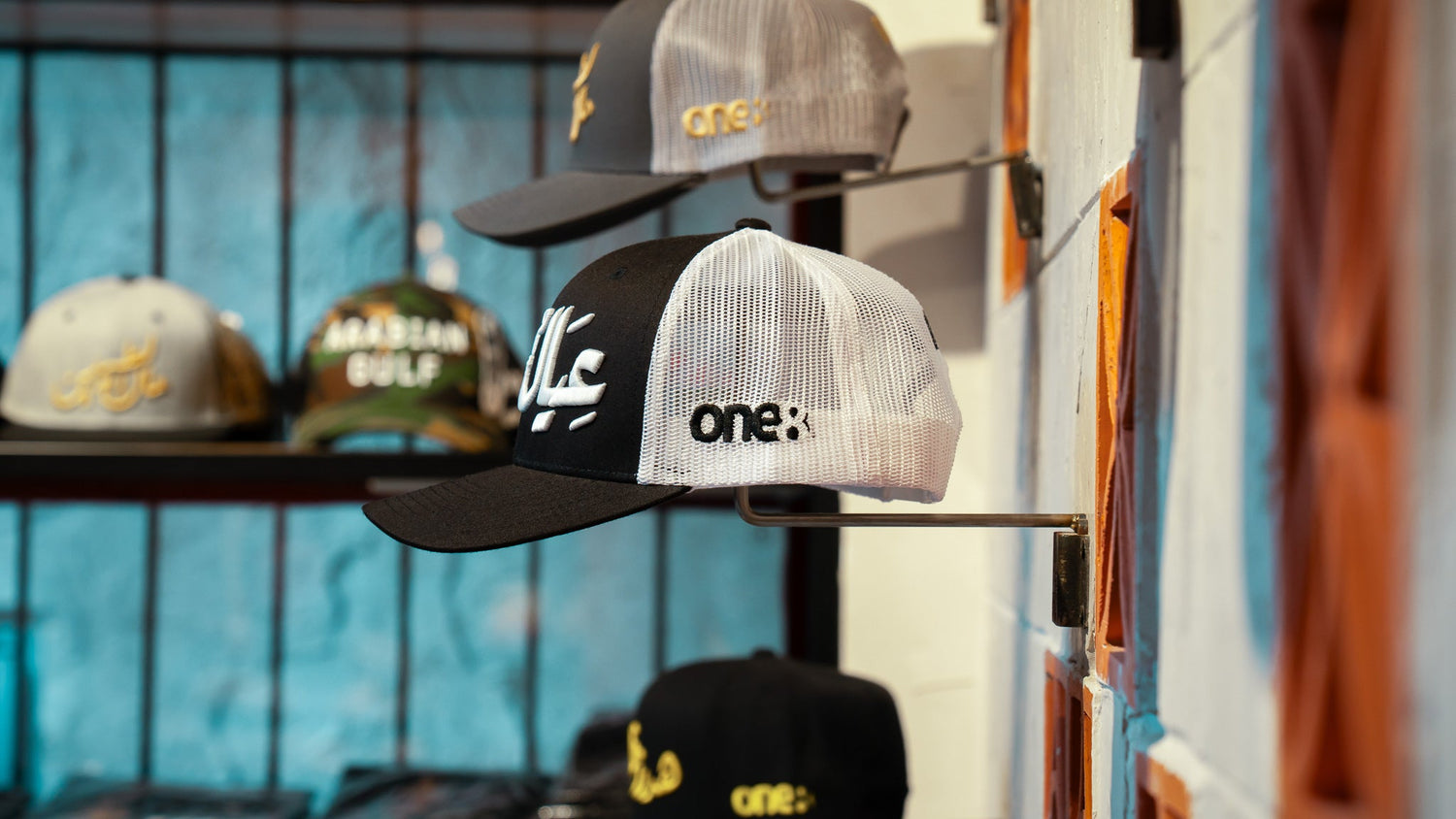 One8 bestselling Arabic trucker hats, side view – Gulf streetwear, Dubai