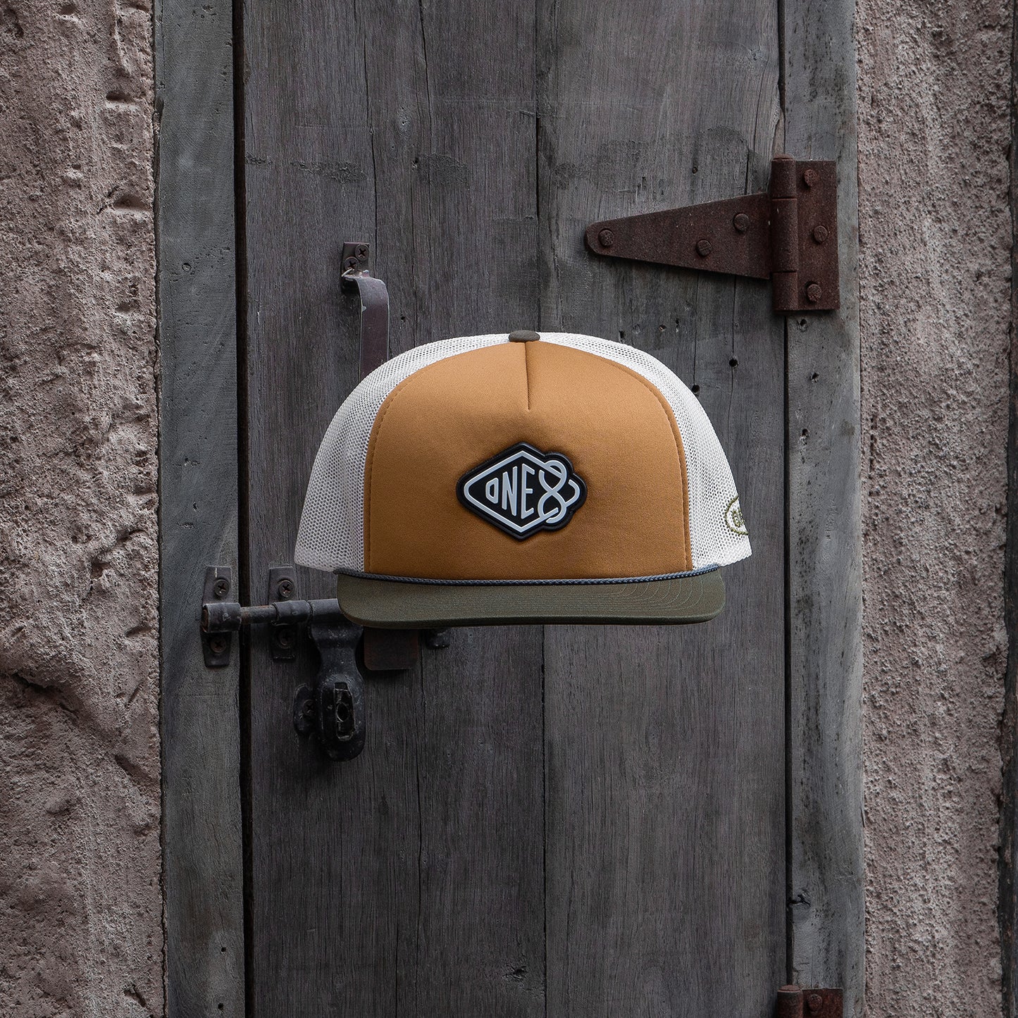 One8 Golden Sands foam trucker hat with sun-soaked desert design, Dubai streetwear cap
