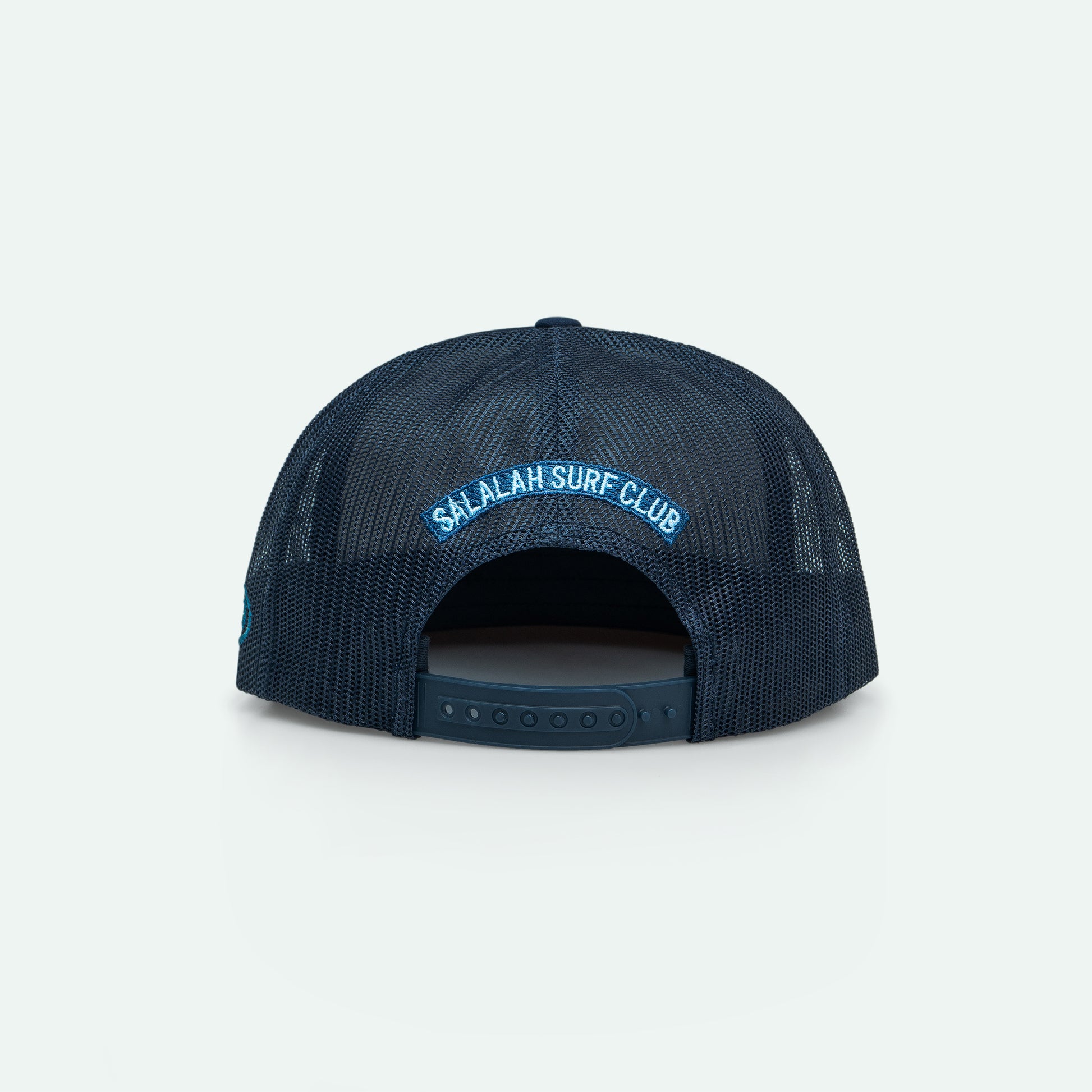 Salalah Surf Club navy foam trucker hat with Omani coastal embroidery, cap by One8
