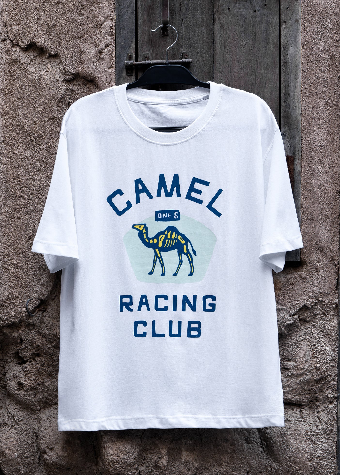 Skeletal Camel Racing Club tee with skeleton camel graphic, Gulf desert streetwear by One8