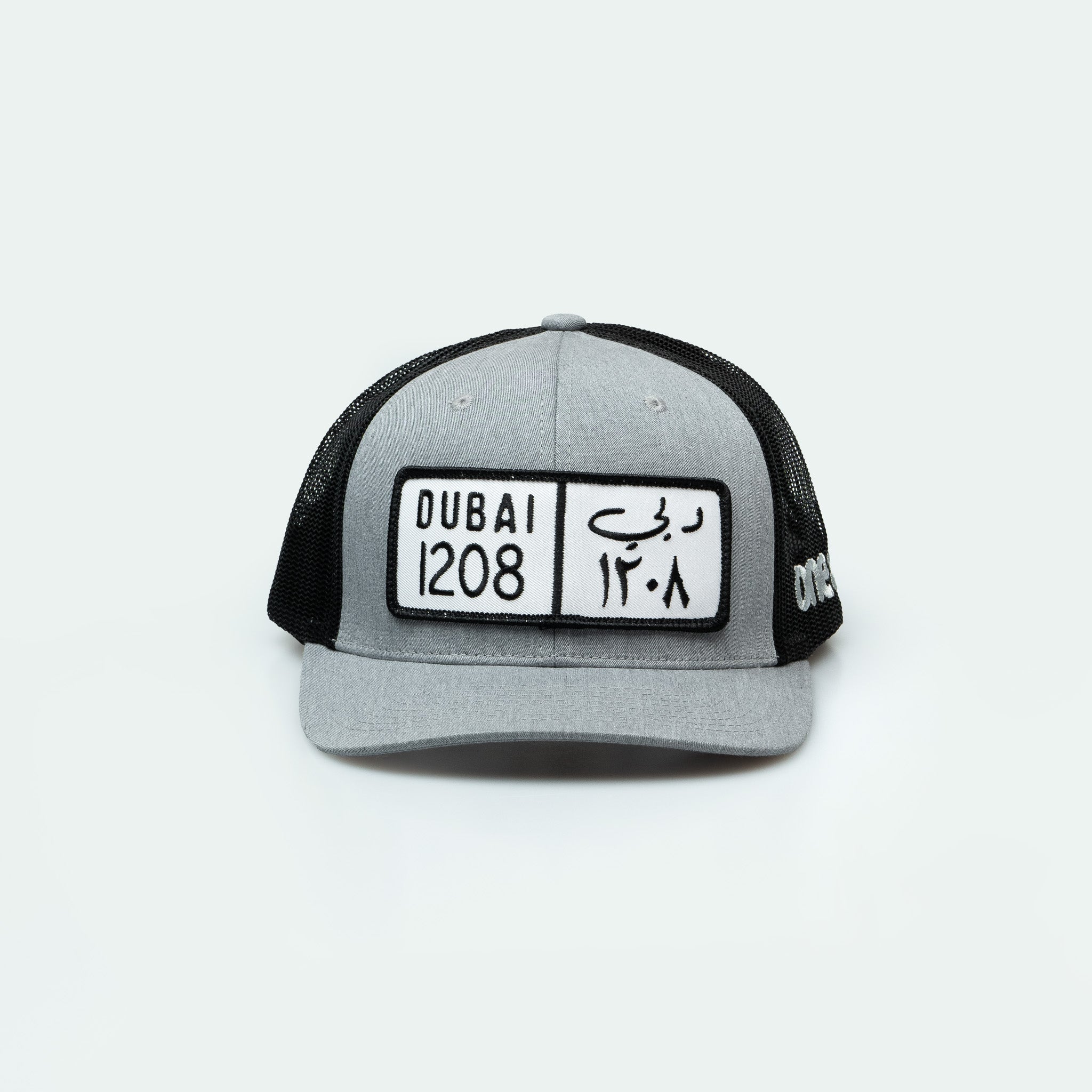 كاب دبي Dubai License Plate Curved Brim Meshback Trucker Hat - One8 Hat- Arabic pop culture