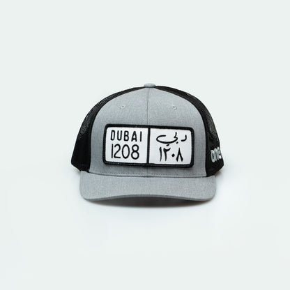 كاب دبي Dubai License Plate Curved Brim Meshback Trucker Hat - One8 Hat- Arabic pop culture