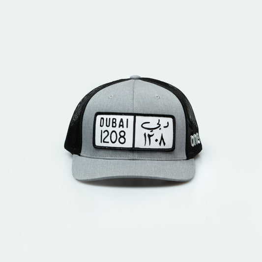 كاب دبي Dubai License Plate Curved Brim Meshback Trucker Hat - One8 Hat- Arabic pop culture
