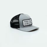 كاب دبي Dubai License Plate Curved Brim Meshback Trucker Hat - One8 Hat- Arabic pop culture