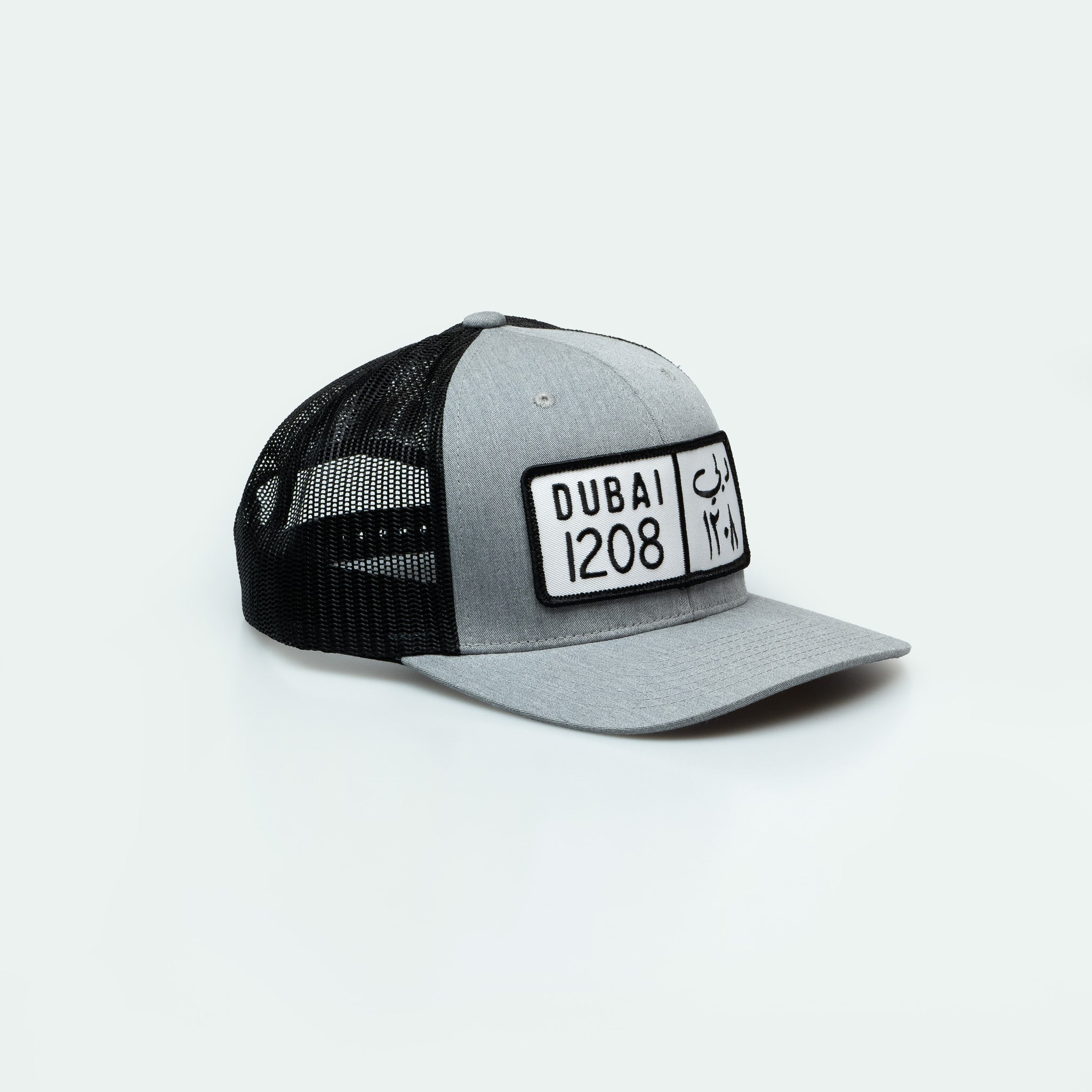 كاب دبي Dubai License Plate Curved Brim Meshback Trucker Hat - One8 Hat- Arabic pop culture