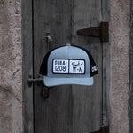 كاب دبي Dubai License Plate Curved Brim Meshback Trucker Hat - One8 Hat- Arabic pop culture