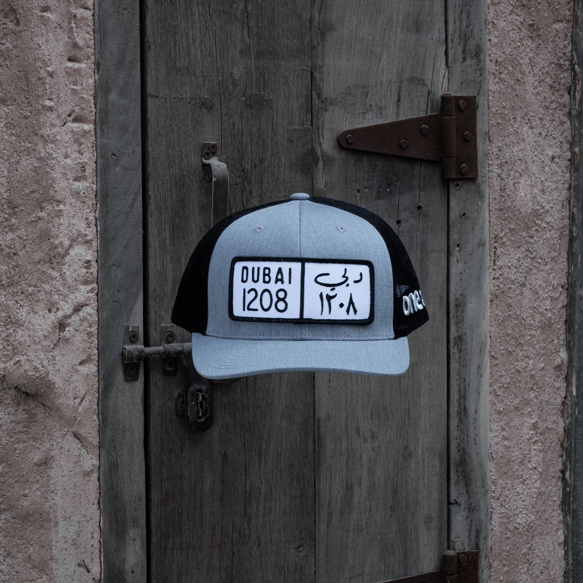 كاب دبي Dubai License Plate Curved Brim Meshback Trucker Hat - One8 Hat- Arabic pop culture