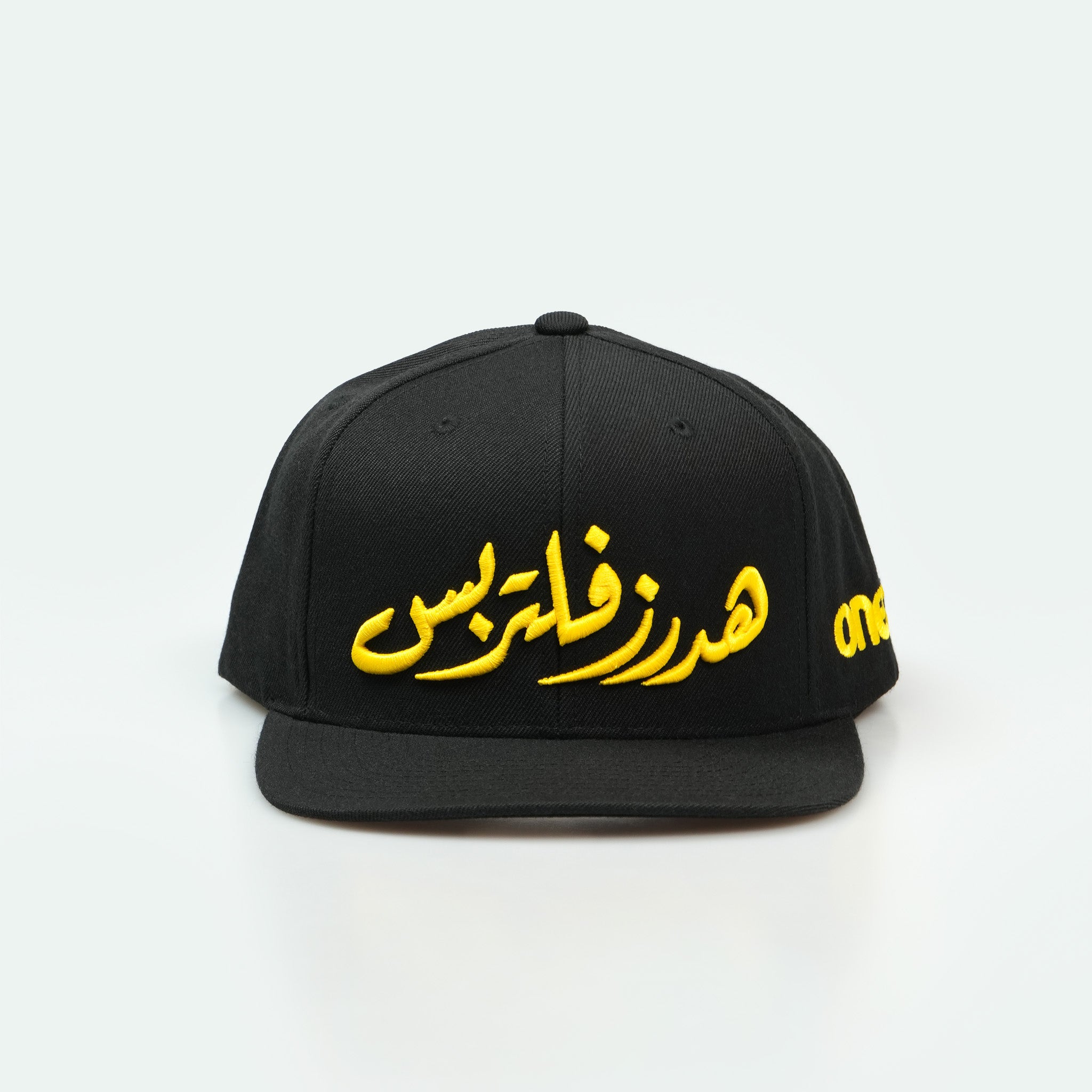 هدرز فلتر بس Emirati Street Racing Hat: Black trucker cap with bold Arabic text car culture One8 Hat