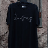 Houbara in Flight Black T-shirt - featuring a حبارى (houbara bustard)  designed by Khalid Al Astad 
