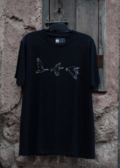 Houbara in Flight Black T-shirt - featuring a حبارى (houbara bustard)  designed by Khalid Al Astad 