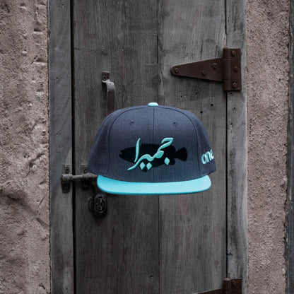 Jumeira Snapback with bold جميرا design, inspired by Dubai's laid-back coastal style One8 hat