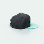 Jumeira Snapback with bold جميرا design, inspired by Dubai's laid-back coastal style One8 hat