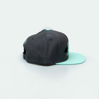 Jumeira Snapback with bold جميرا design, inspired by Dubai's laid-back coastal style One8 hat