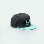 Jumeira Snapback with bold جميرا design, inspired by Dubai's laid-back coastal style One8 hat