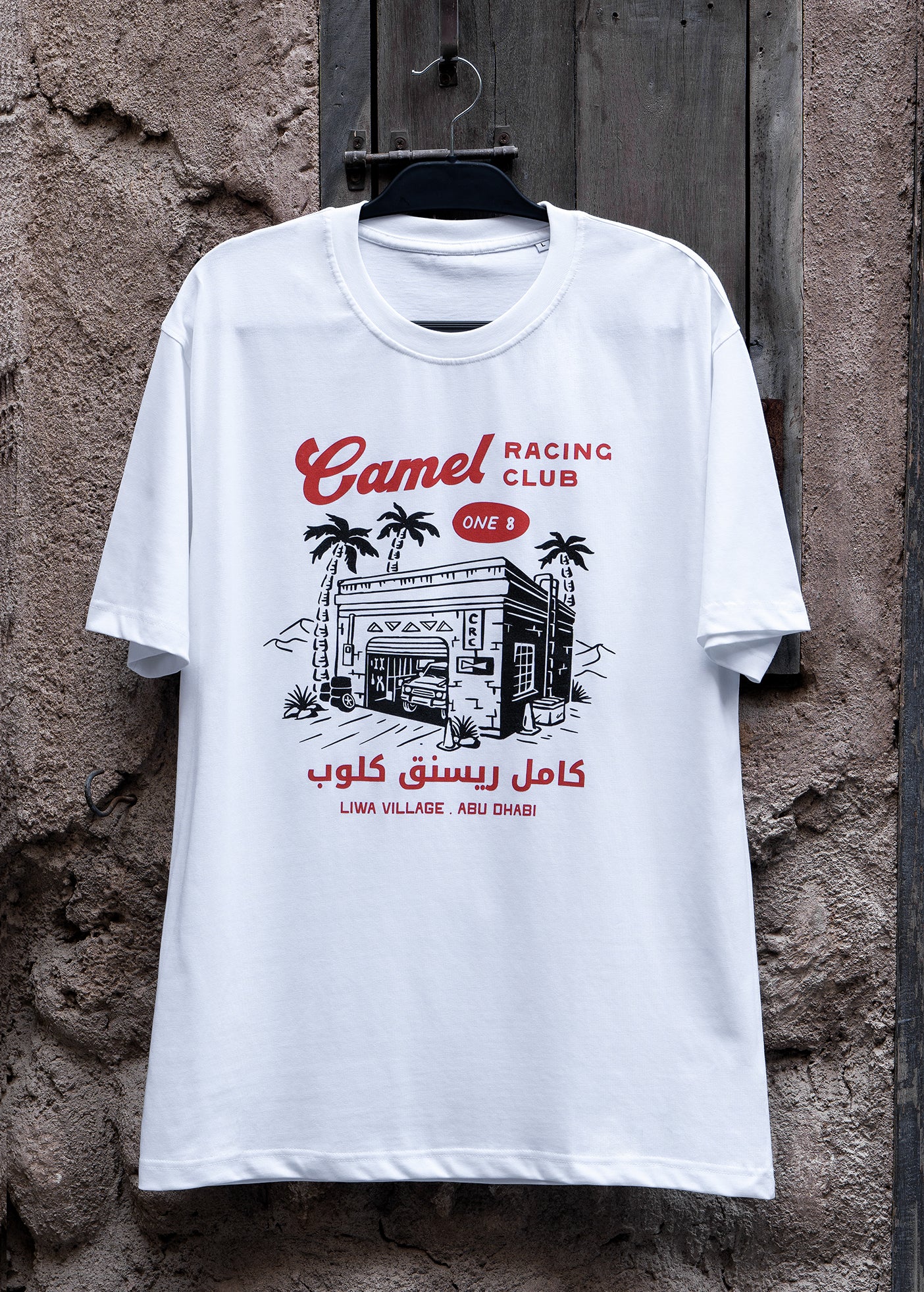 Desert Workshop Camel Racing Club tee with Gulf racing mechanic graphic by One8