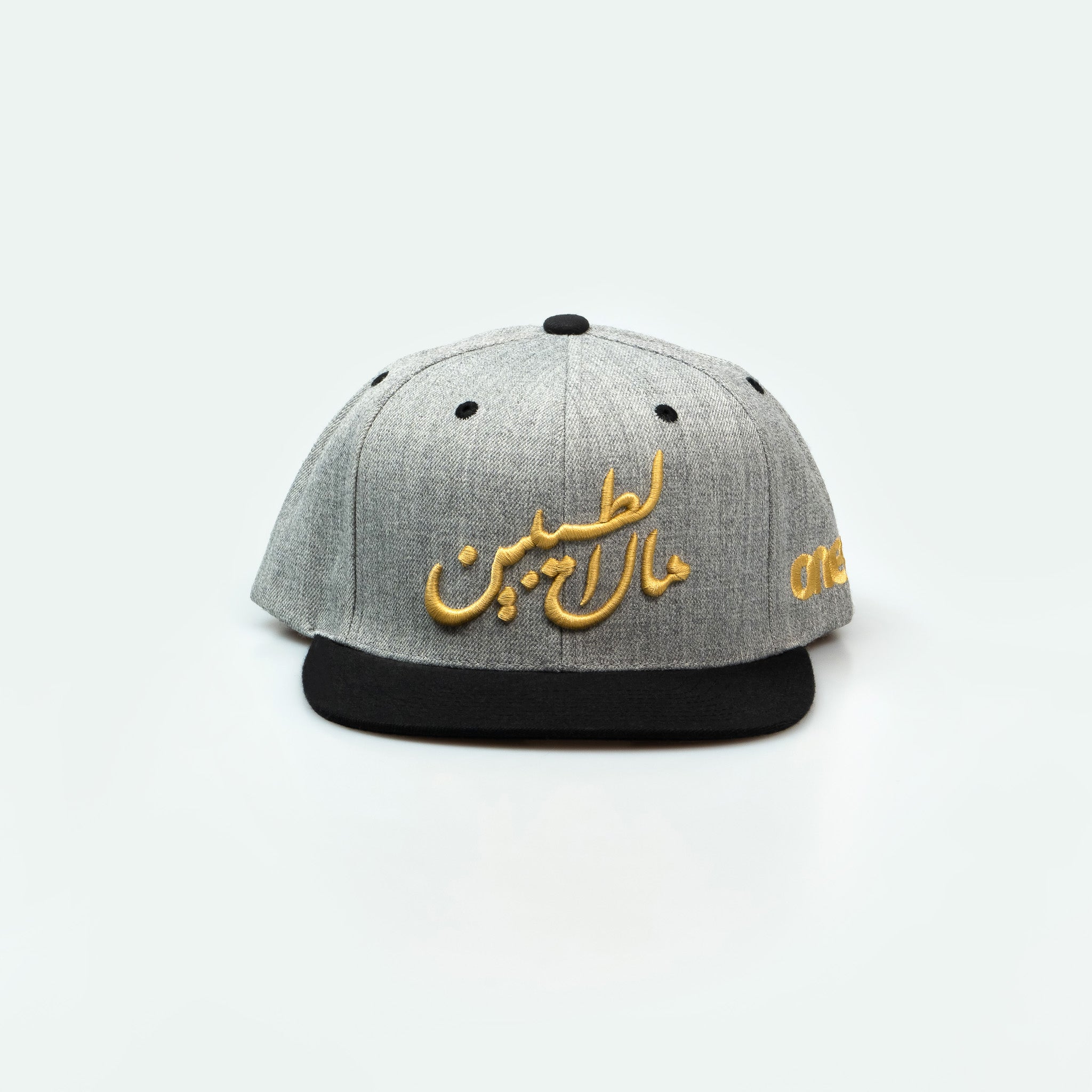 مال الطيبين trucker cap with Arabic calligraphy showing Gulf nostalgia and pride in Arabic One8 Hat