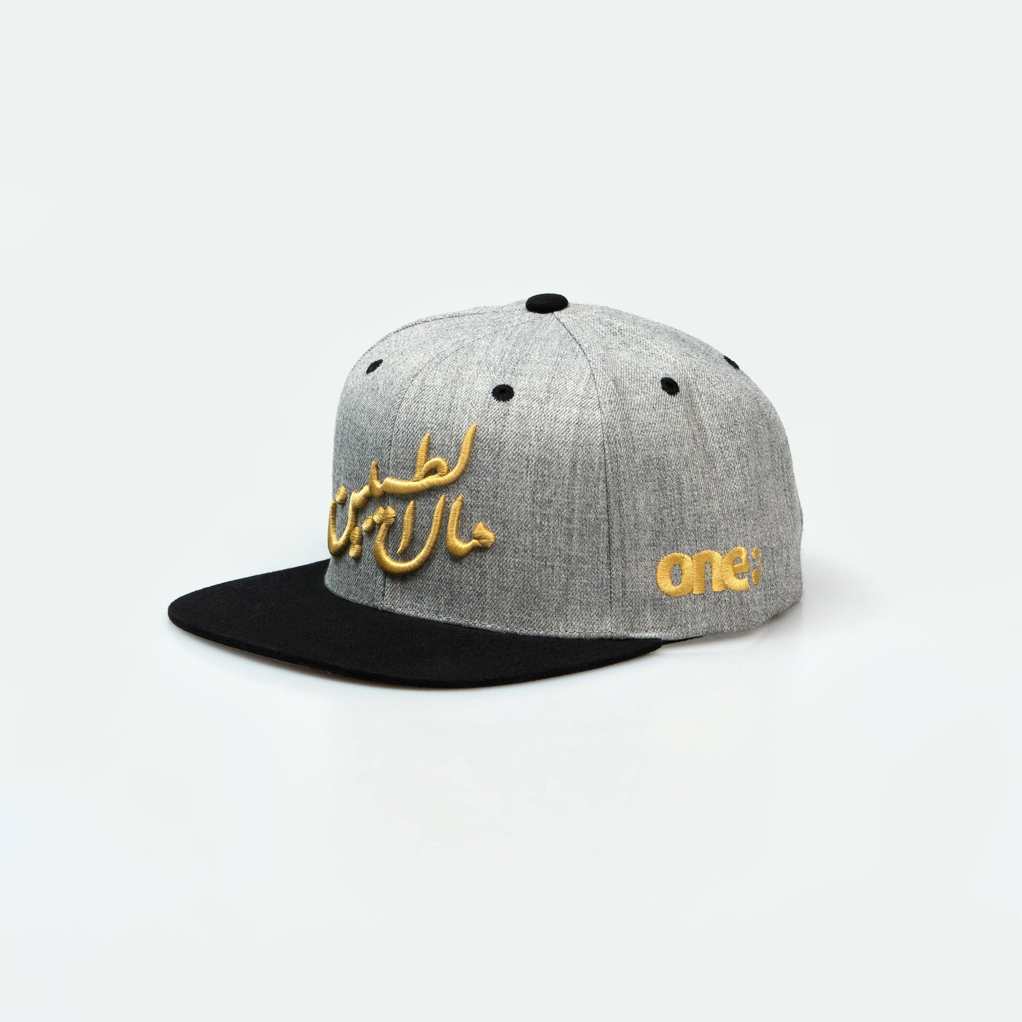 مال الطيبين trucker cap with Arabic calligraphy showing Gulf nostalgia and pride in Arabic One8 Hat