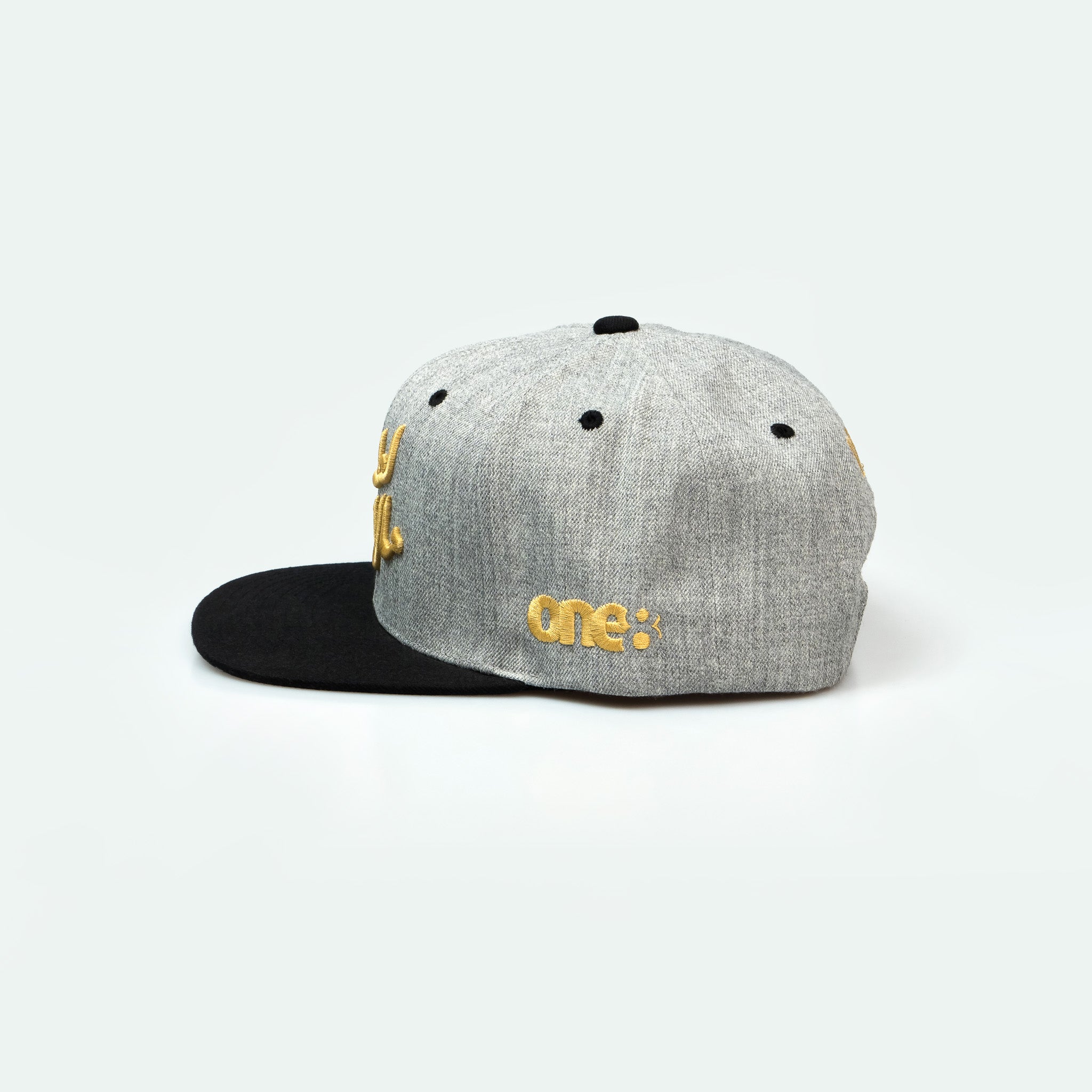مال الطيبين trucker cap with Arabic calligraphy showing Gulf nostalgia and pride in Arabic One8 Hat