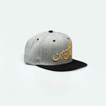 مال الطيبين trucker cap with Arabic calligraphy showing Gulf nostalgia and pride in Arabic One8 Hat