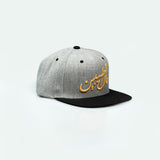 مال الطيبين trucker cap with Arabic calligraphy showing Gulf nostalgia and pride in Arabic One8 Hat