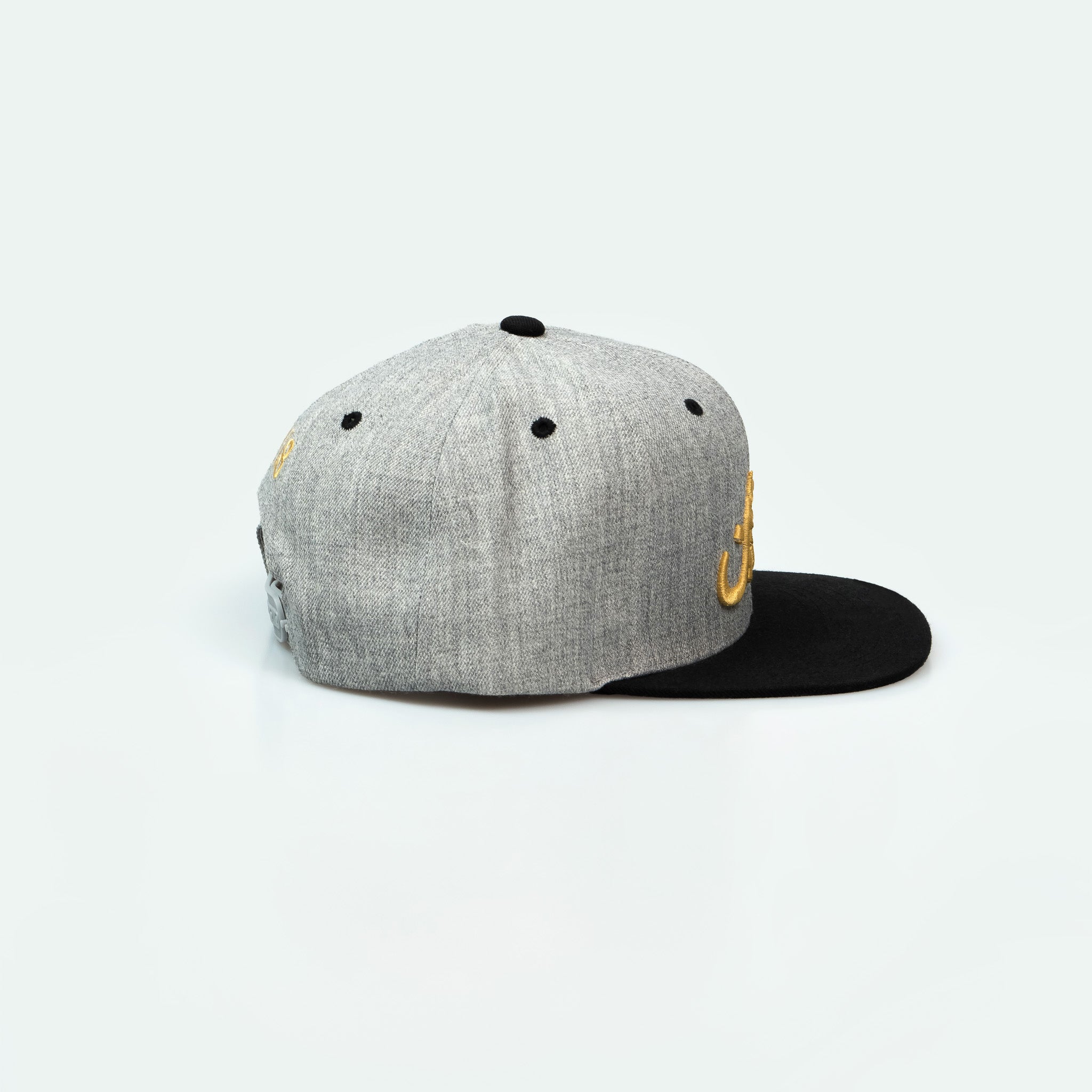 مال الطيبين trucker cap with Arabic calligraphy showing Gulf nostalgia and pride in Arabic One8 Hat