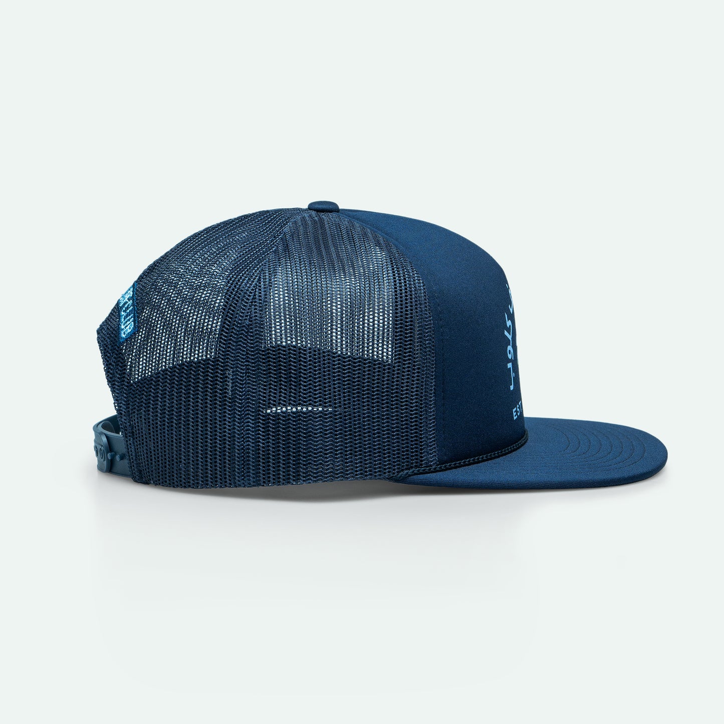 Salalah Surf Club navy foam trucker hat with Omani coastal embroidery, cap by One8