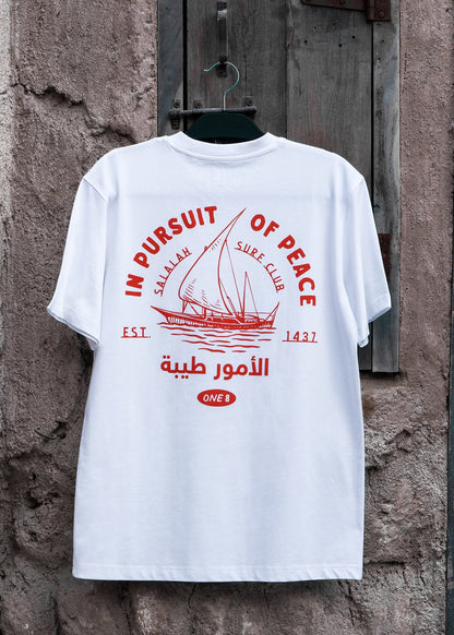 Salalah Surf Club dhow tee with hand-drawn dhow, Arabic Gulf streetwear by One8