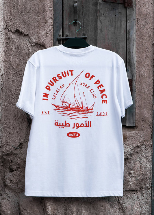 Salalah Surf Club dhow tee with hand-drawn dhow, Arabic Gulf streetwear by One8