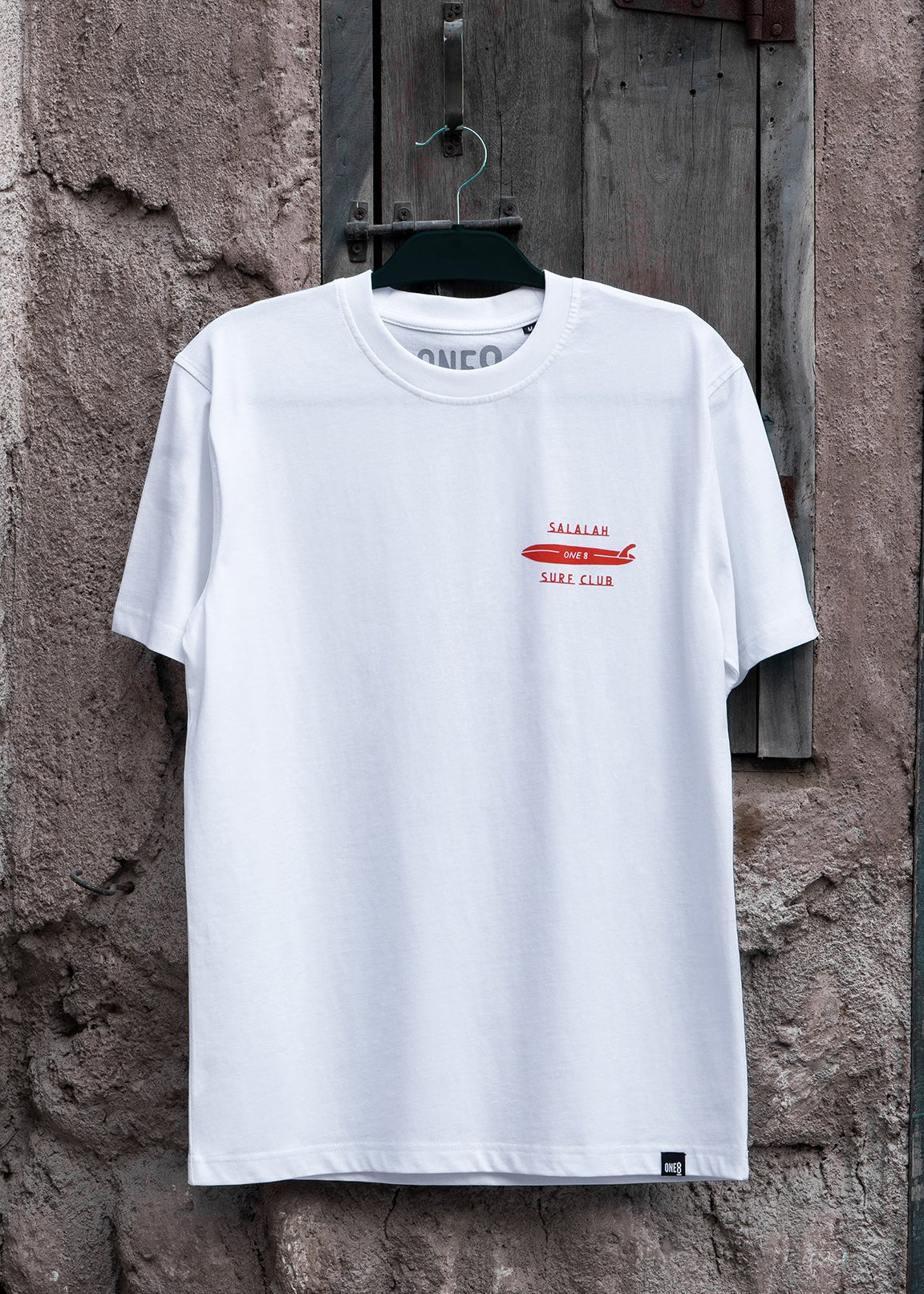 Salalah Surf Club dhow tee with hand-drawn dhow, Arabic Gulf streetwear by One8