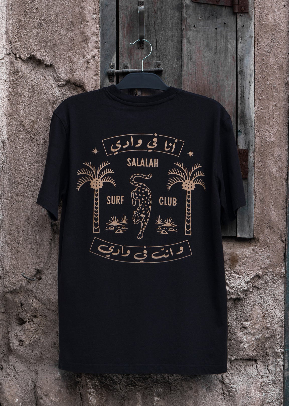 Salalah Surf Club Arabian leopard tee with illustrated leopard, Omani culture streetwear by One8