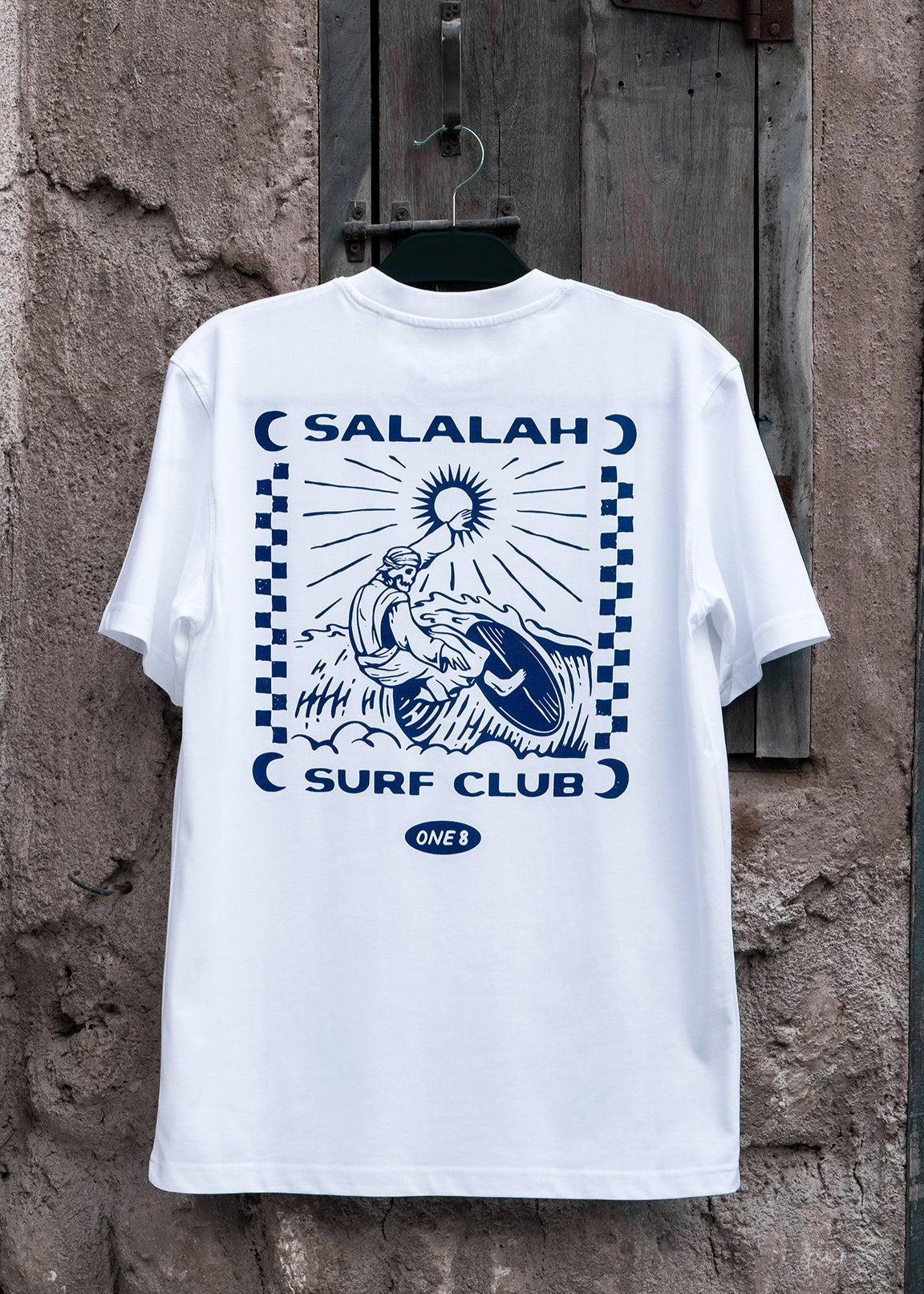 Salalah Surf Club Omani surfer tee with Dhofari attire surfer, Omani culture streetwear by One8