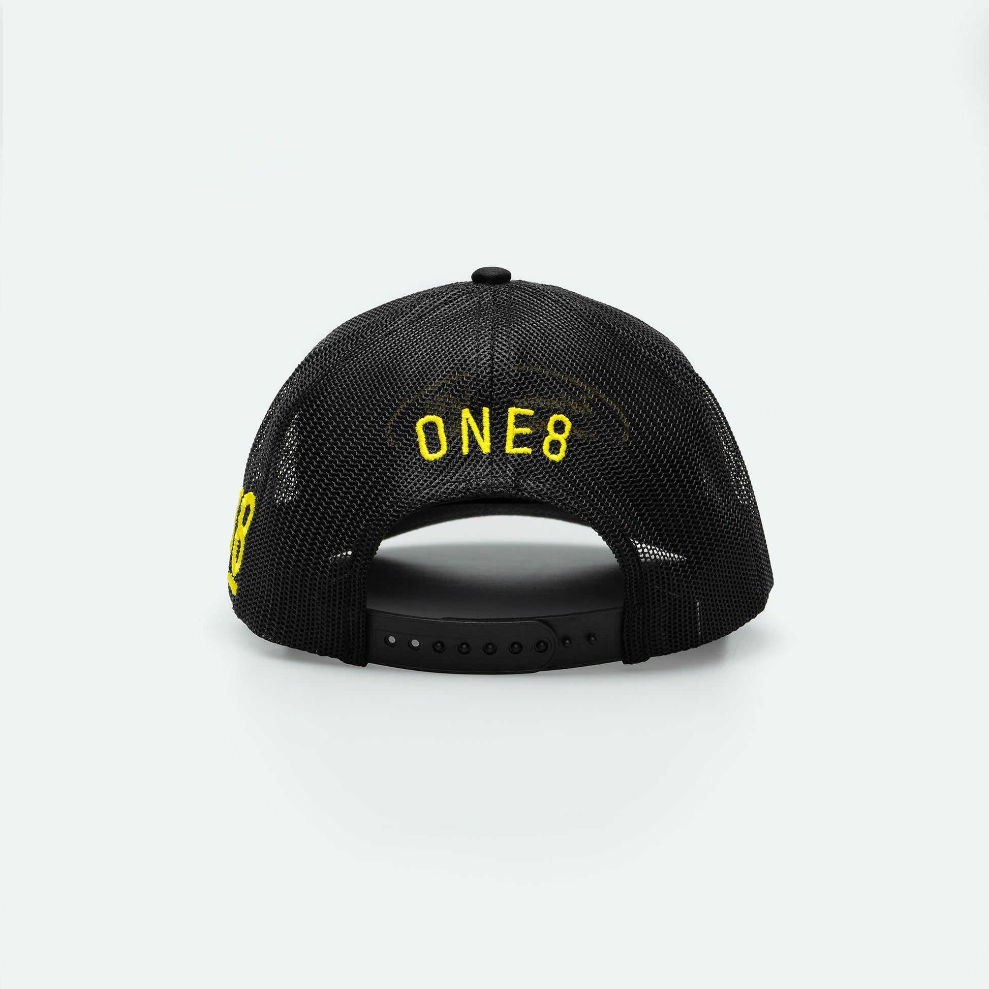 Smile الابتسامة واجب اجتماعي meshback trucker hat with flat Arabic text, One8 cap