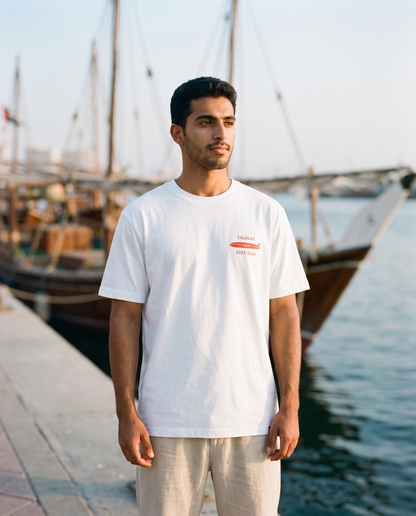 Salalah Surf Club Dhow tee front chest print, male model, oversized fit