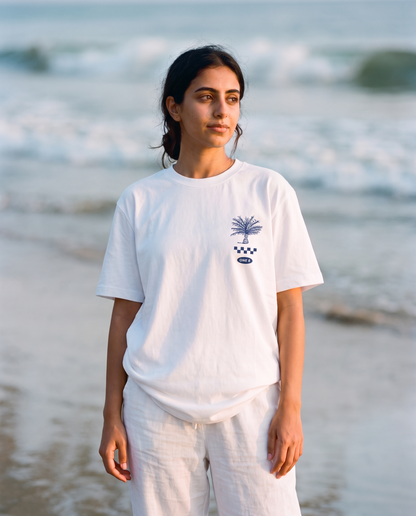 Salalah Surf Club Omani Surfer tee front chest print, female model, oversized fit