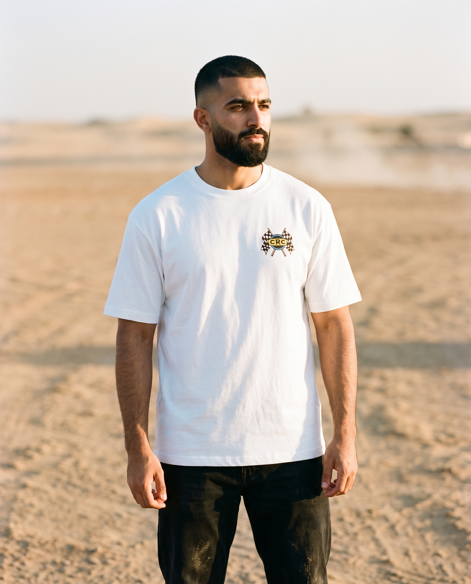 Winner's Circle Camel Racing Club tee front CRC flags chest print, male model
