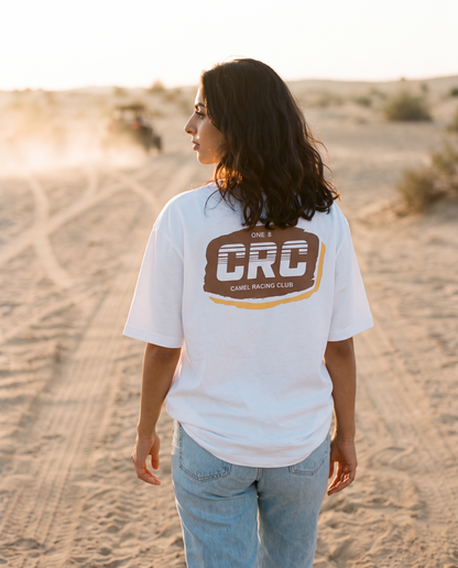 Motocross Camel Racing Club tee CRC badge print, female model walking desert trail