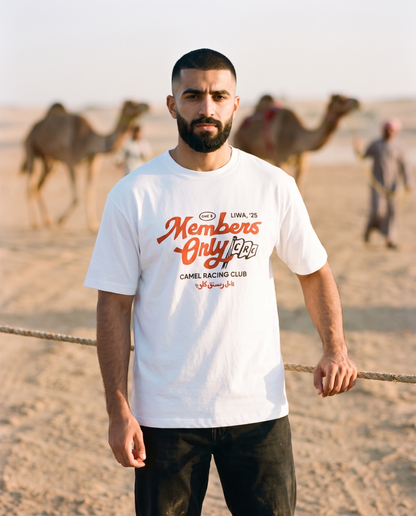 Members Only Camel Racing Club tee, male model at camel paddock rope