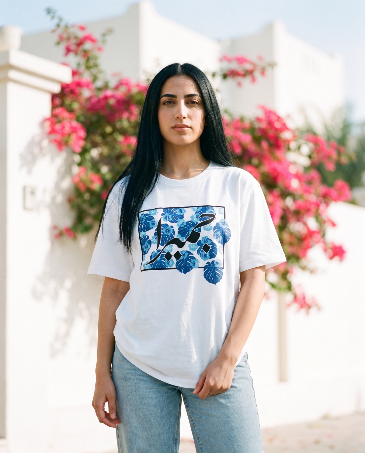 Jumeirah Floral unisex tee blue floral print worn by female model