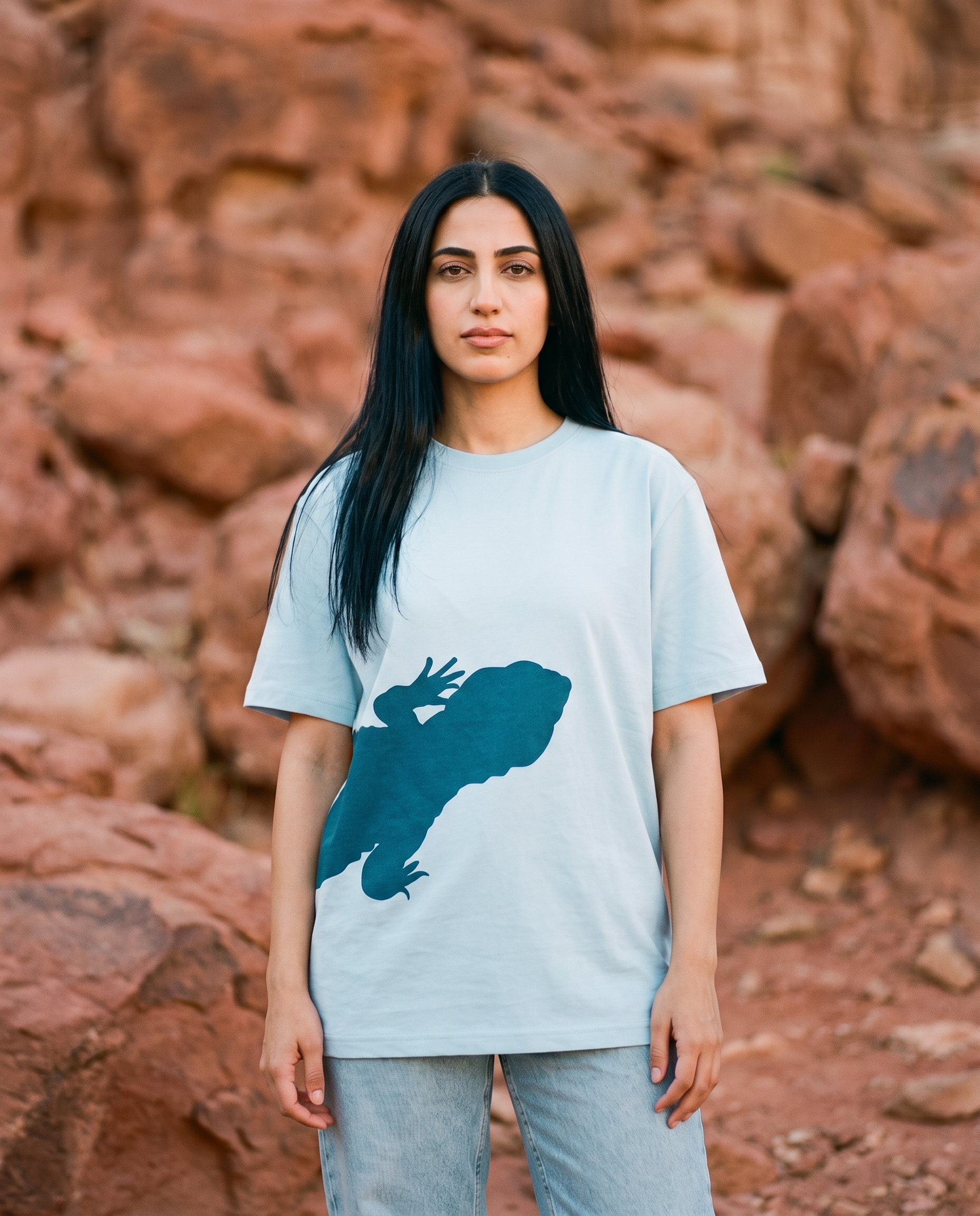 Uromastyx Dhab tee front lizard print worn by female model in red rocky desert