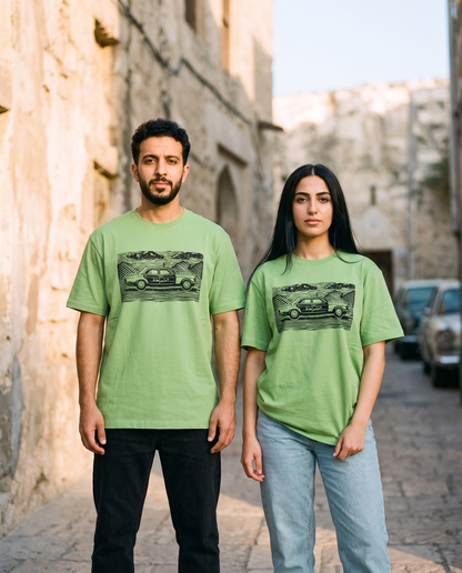 Vintage Dubai Linocut tee worn by male and female models on an old Dubai street