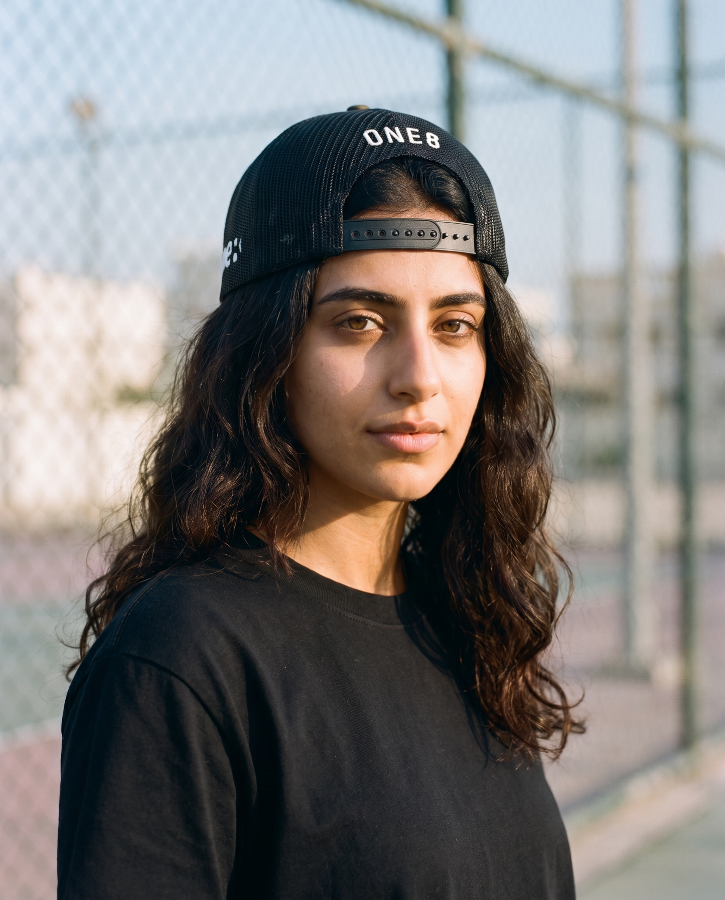 Arabian Gulf camo trucker worn backwards - on model