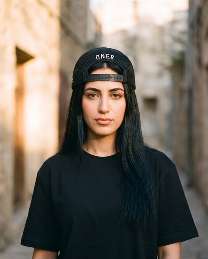 DXB Plate trucker hat worn backwards - on model