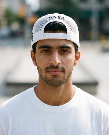 One8 Skate Logo trucker worn backwards - on model