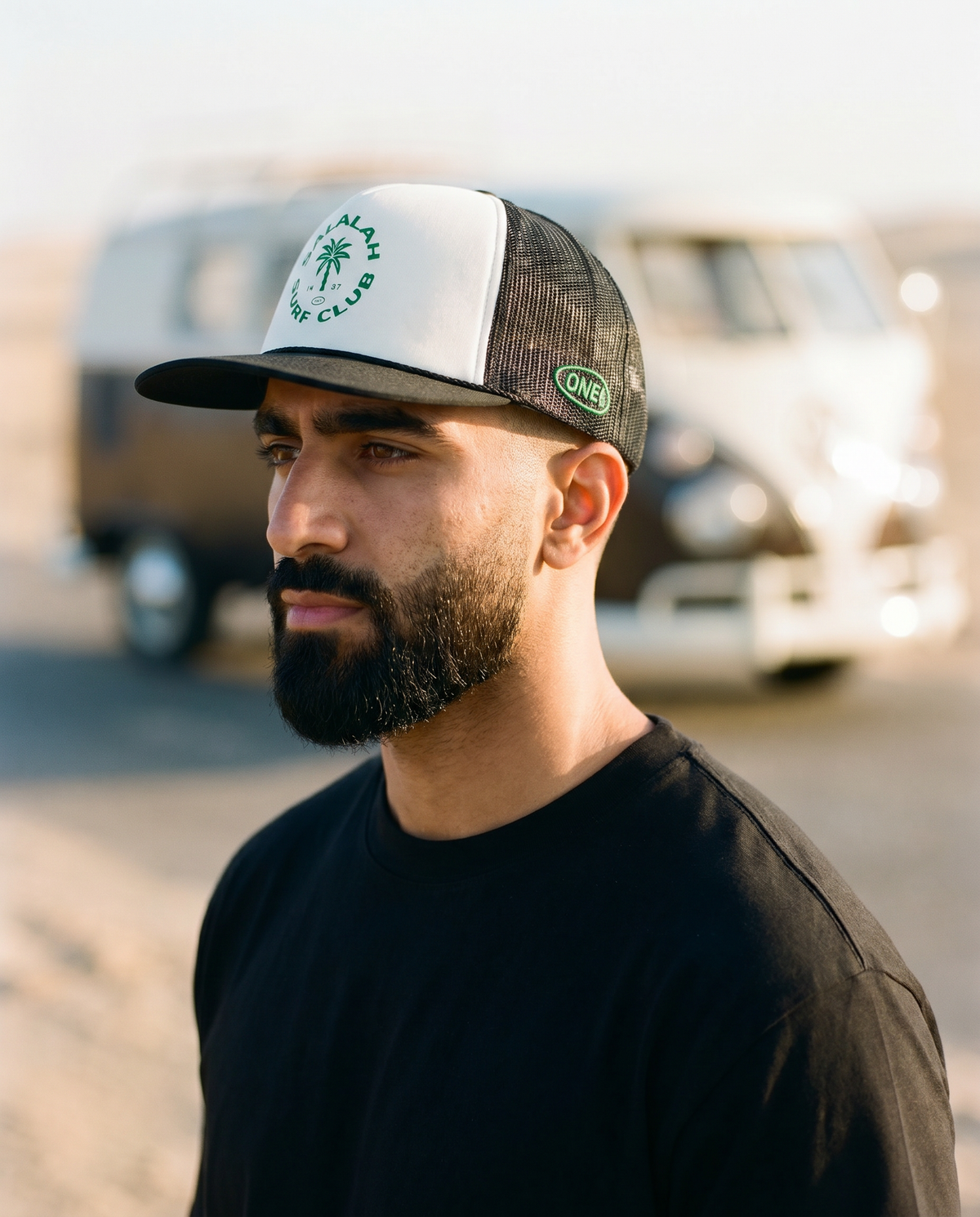 Salalah Surf Club Logo foam trucker side profile - on model